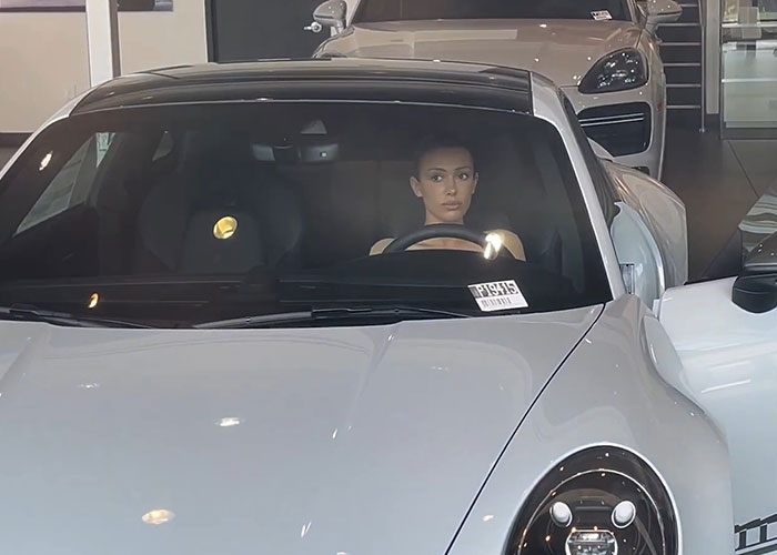 Bianca Censori Goes Porsche Shopping With Kanye West While Wearing An All-Nude Set 3