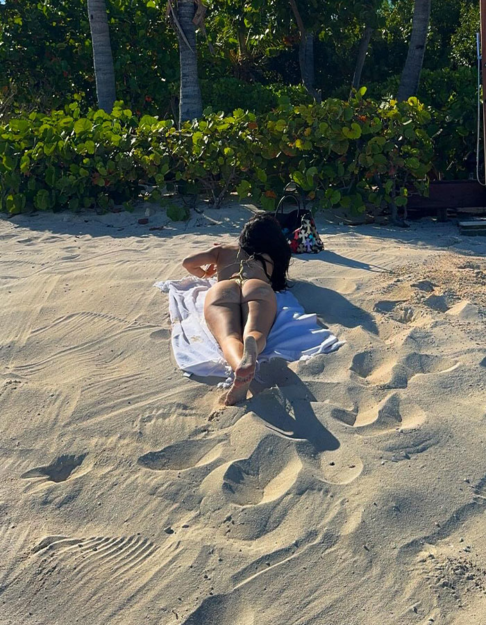 Netizens Suspicious As Kylie Jenner Flaunts Round Butt In A Revealing Golden Bikini 5