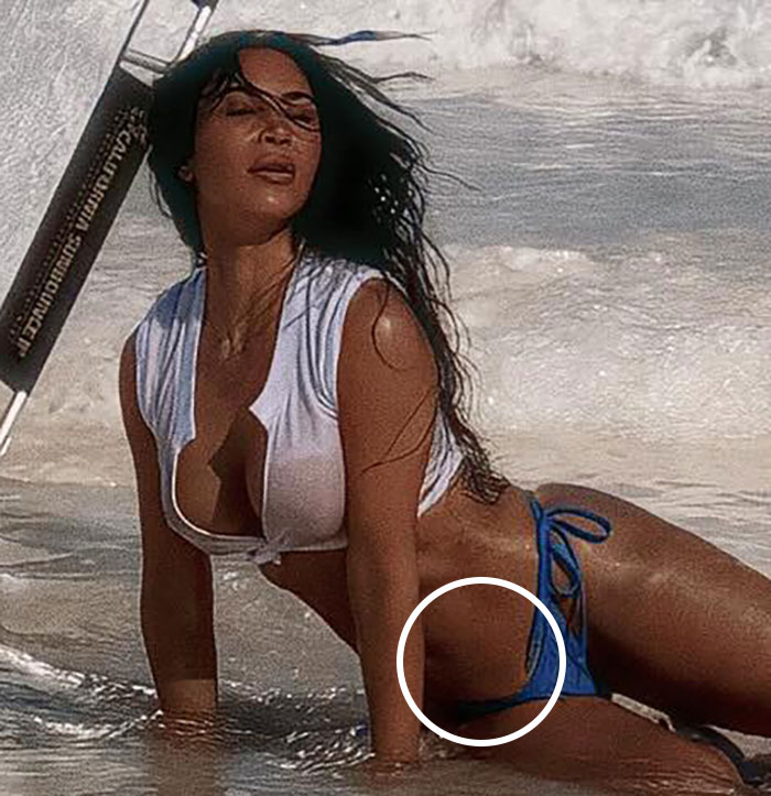 People Accuse Kim Kardashian Of Photoshop Fail In New Bikini Pics: “3rd Pic Obviously” 6